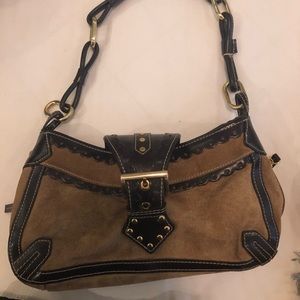 Small brown Wilson’s leather purse